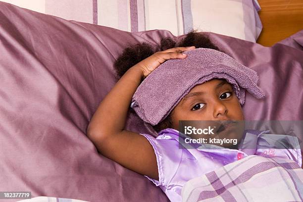 Sick Preschooler In Bed Stock Photo - Download Image Now - Child, African-American Ethnicity, Fever