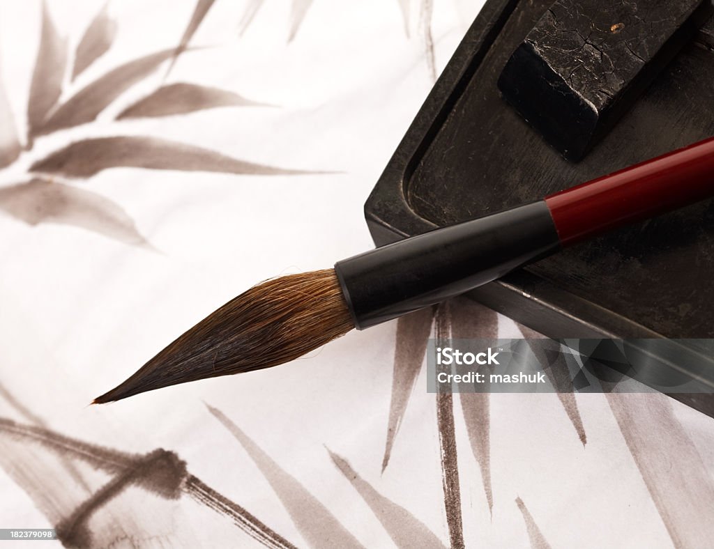 Sumi-e brush over drawing Traditional Japanese sumi-e brush with painting in the background Japanese Culture stock illustration