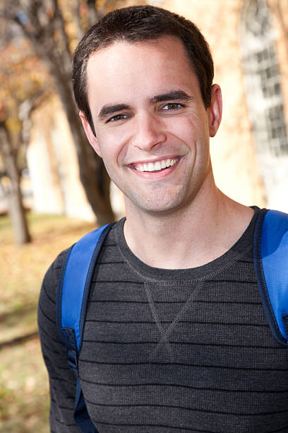 istock Happy Male College Student Portrait on School Campus 182379556