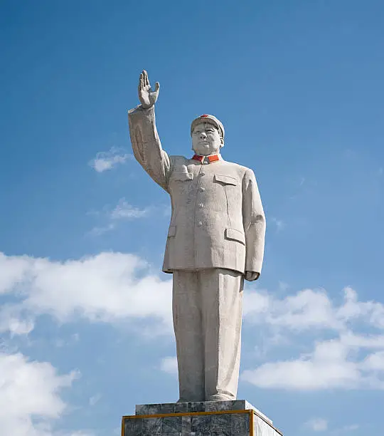 Historic statue to Mao Zedong (or Tse-tung) in the Chinese city of Lijiang.  Mao Zedong was the leader of the Communist Party of China from the inception of the People' Republic of China in 1949 until his death in 1976.