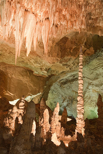 Carlsbad Caverns National Park "Totem Pole and Chandelier" The Totem Pole and Chandelier in the Hall of Giants area of the Big Room in Carlsbad Caverns National Park carlsbad texas stock pictures, royalty-free photos & images