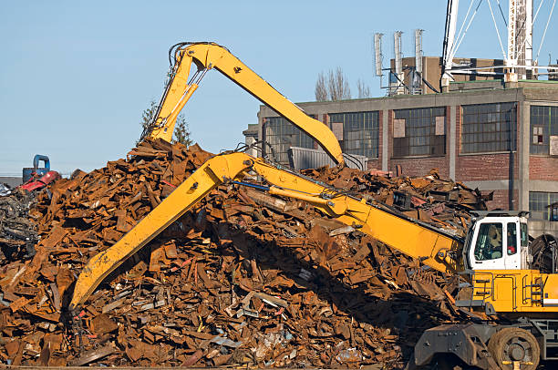 istock Cranes moving scrap metal at recycler 182379816