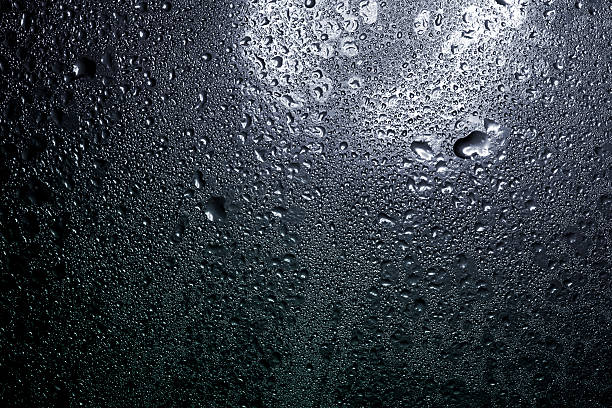istock Patterns of cold condensation on a dark background 182380117