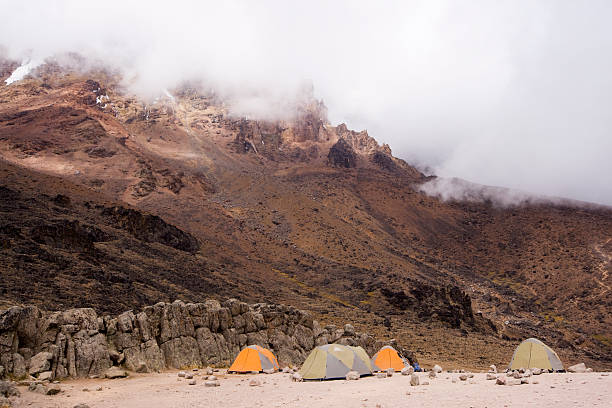Tents over clouds for people trekking Mount Kilimanjaro, Tanzania