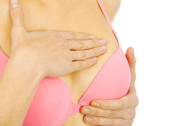 проверять на груди - breast sensuality women touching стоковые фото и изображения