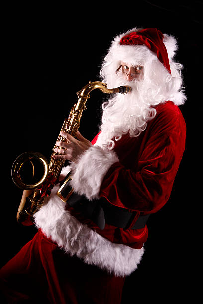 istock Santa Claus Playing the Saxophone 182381157
