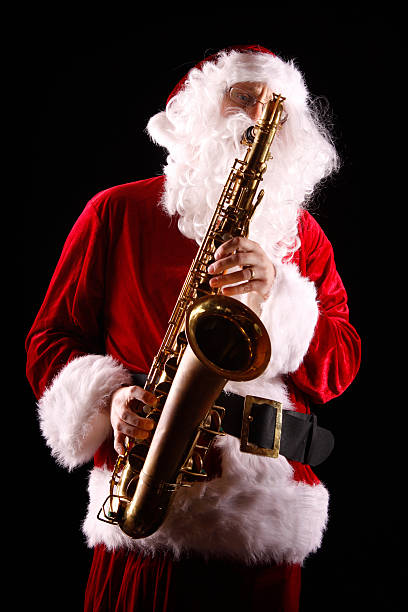 istock Santa Claus Playing the Saxophone 182381172