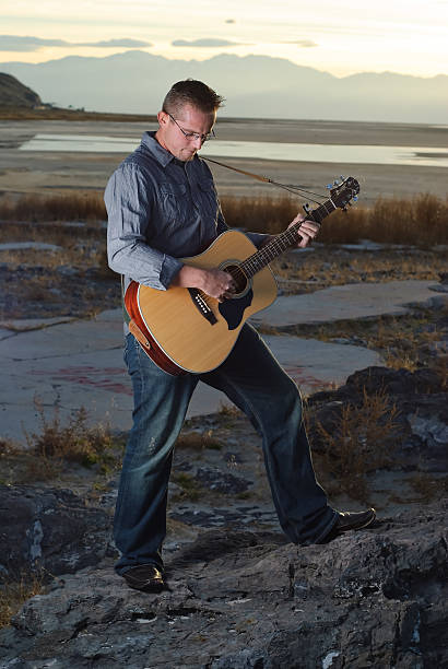 istock Outdoor guitarist 182381963