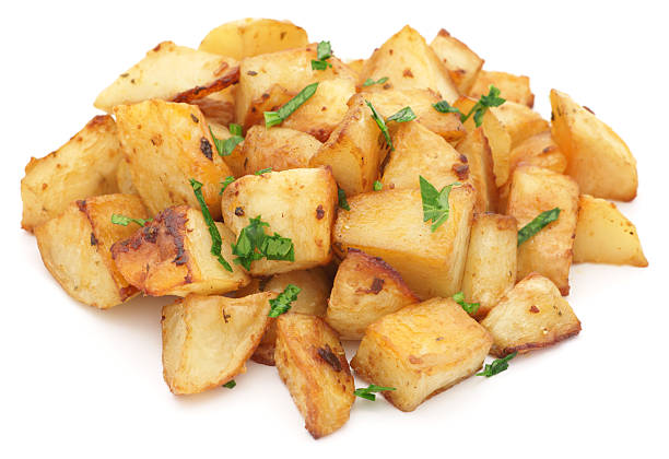 istock Baked potato pile with parsley isolated on white 182382704
