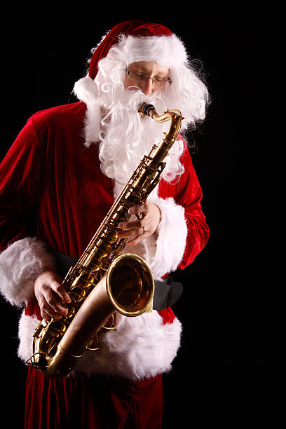istock Santa Claus Playing the Saxophone 182383190