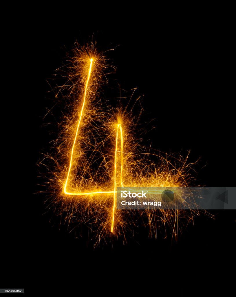 Number Four Drawn in Fireworks Number four/ 4 drawn in fireworks Black Color Stock Photo