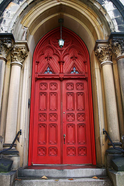 istock Red door and columns on a church 182384078