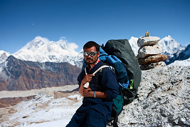 istock Nepali porter against a background of Mount Everest 182384446