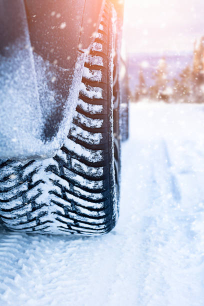 istock Winter tires on snow on a sunny day 1823850456