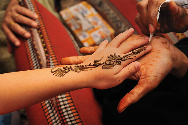 Henna Tattoo Artist Stock Photos, Pictures & Royalty-Free Images - iStock