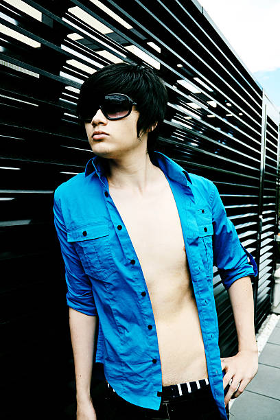 istock Attractive Asian Man In Blue Shirt 182386885