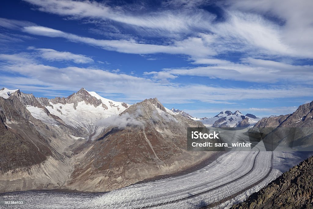 Aletsch Glacier and mountains in Switzerland on a sunny day The Aletsch glacier - Europe's largest glacier - in Switzerland. Aerial View Stock Photo