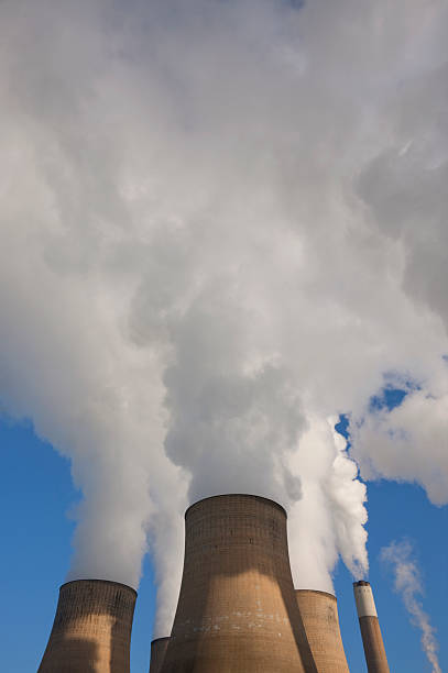 istock Cooling towers at a coal fueled power station. 182389463