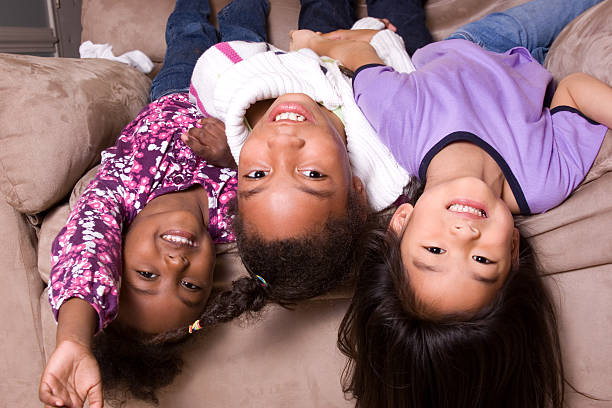 istock Girls hanging upside down 182390953