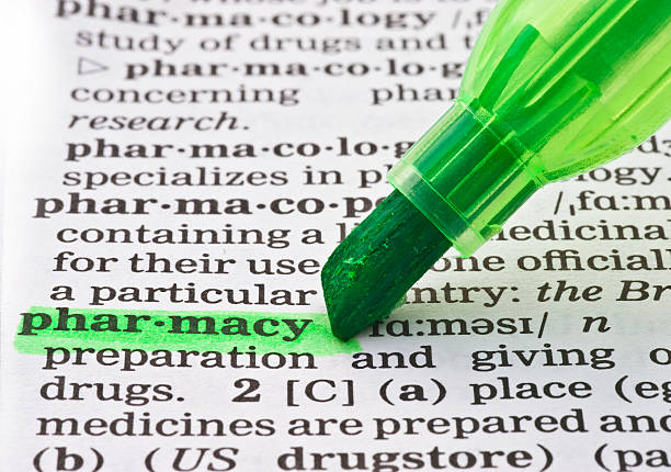 istock definition of pharmacy highligted in dictionary 182391475