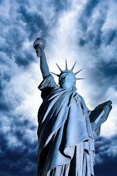 istock Dramatic sky over statue of Liberty 182391561