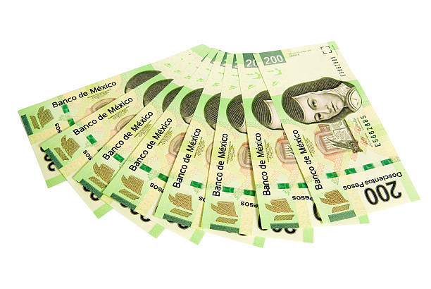 A fan of $200 Mexican pesos isolated on white background