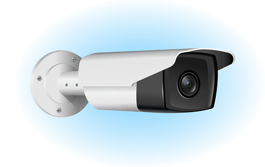White surveillance camera on blue background