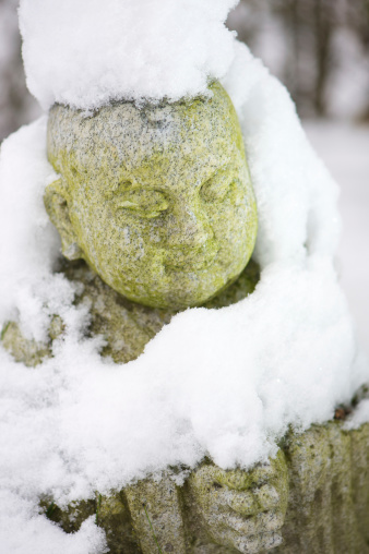 Buddha statue in snow