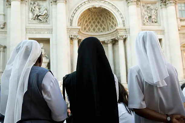 "Nuns outside the Trevi Fountain, Rome."