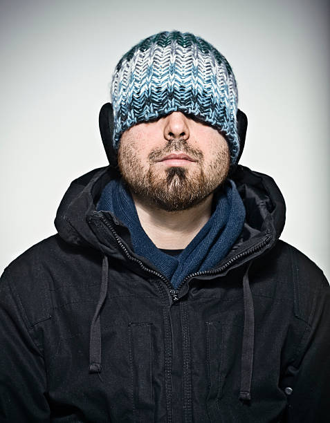 istock young man with winter hat and earflaps 182392731