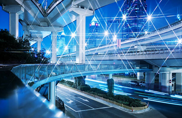 the light trails on the modern building background in shanghai china.
