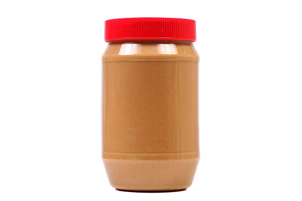 Horizontal image of peanut butter jar isolated on white.