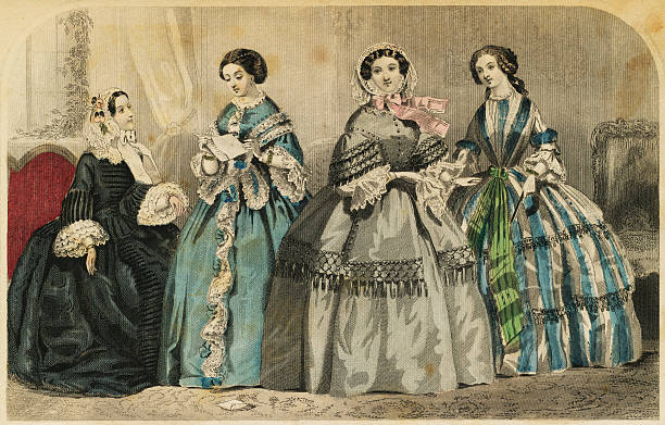 Hand colored engraving from 1857 of women's fashion.  The engraving is now in the public domain.