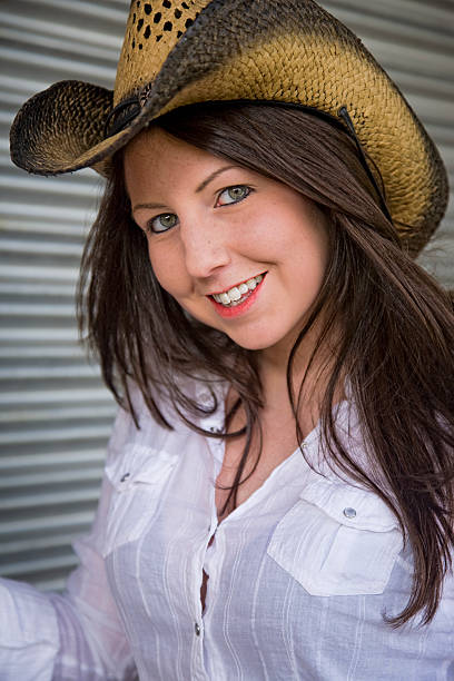 istock Happy Beautiful Cowgirl 182393663
