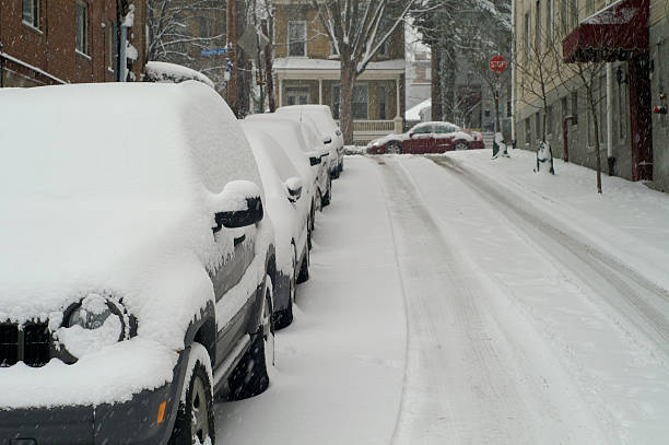 istock Snow Covered Cars 182394008