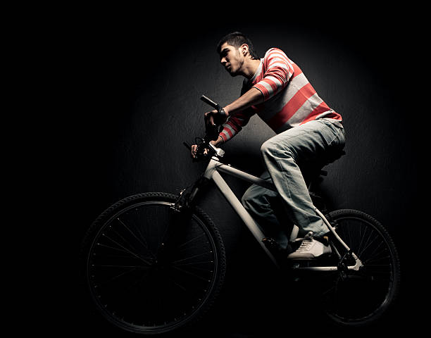 istock Young man and his bike. 182394462
