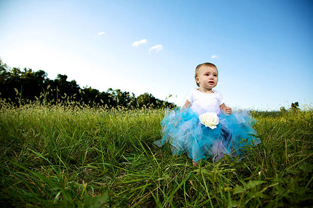 istock summer girl tutu outdoors pasture 182394473