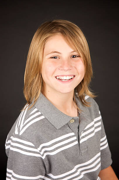 istock Handsome Ten Year Old Boy on Black Background 182394801