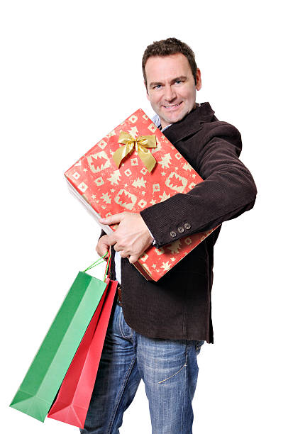 hombre de compras en busca de regalos - male1 fotografías e imágenes de stock