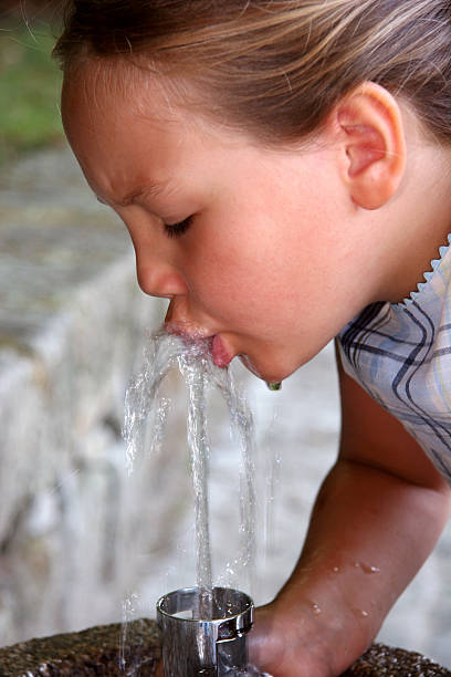 istock Little Girls Drinking Water 182396831