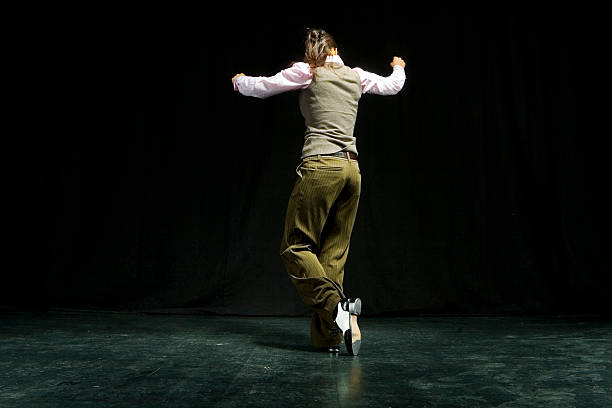 Tap Dancing Woman Stock Photo - Download Image Now - Tap Dancing, Young Adult, Activity - iStock Tap Dancing Woman Stock Photo - Download Image Now - Tap Dancing, Young Adult, Activity - iStock