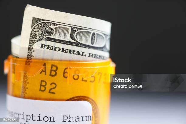 Health Care Costs Stock Photo - Download Image Now - Currency, Pill, Financial Bill