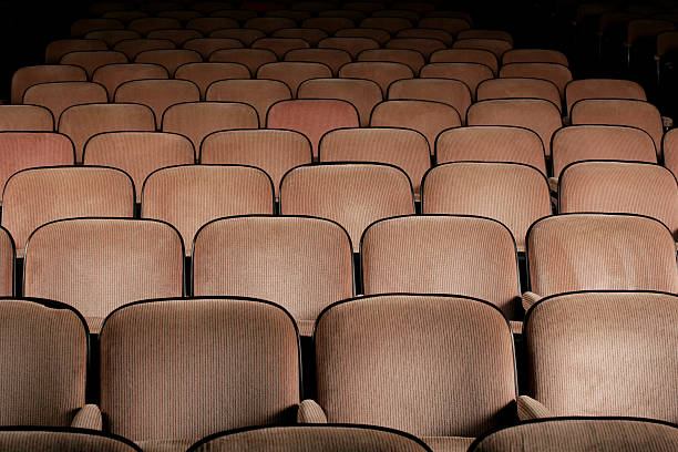 istock close up of empty theatre seats 182397264