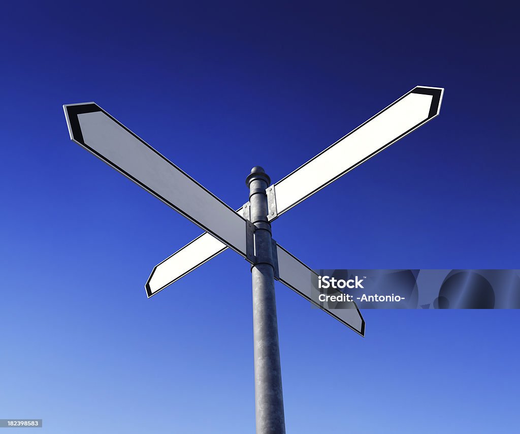 Blank signpost Low-angle view of blank signpost with 4 arrows - just add your text.Clipping path included for easy background change. Four Objects Stock Photo