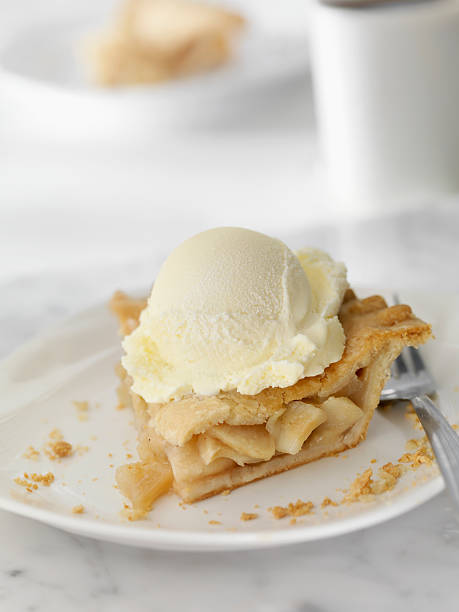 Apple Pie with Vanilla Ice Cream Apple Pie with Vanilla Ice Cream and Coffee -Photographed on Hasselblad H3D2-39mb Camera apple pie a la mode stock pictures, royalty-free photos & images