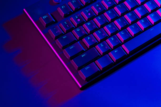 istock Close up of computer keyboard on black background 1823988359