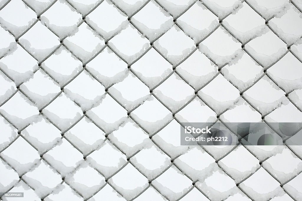 Wire Fence with Snow Wire Fence with Snow. Can be used as a background. Backgrounds Stock Photo