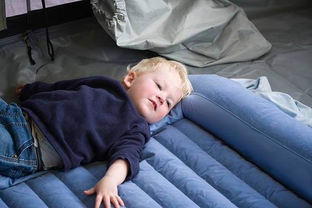 young boy in tent camping pool raft stock pictures, royalty-free photos & images