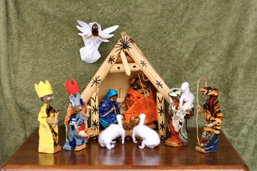 A complete African nativity set made of handcrafted dolls wearing traditional African clothing.
