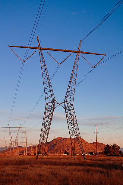 istock Power lines and pylons at dusk. 182399955